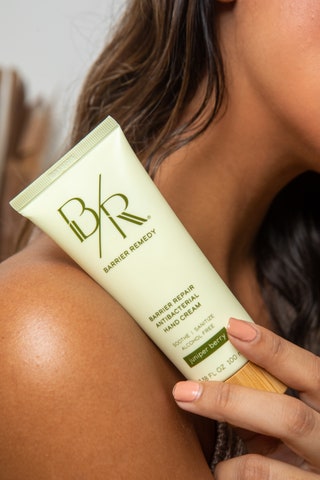 Indulge in the innovative multitasking hand cream by Barrier Remedy an alcoholfree sanitising hand cream that is...