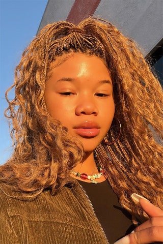 In love with Storm Reid's faded box braids. The blonde hair is weaved in with her natural hair and braided about half...