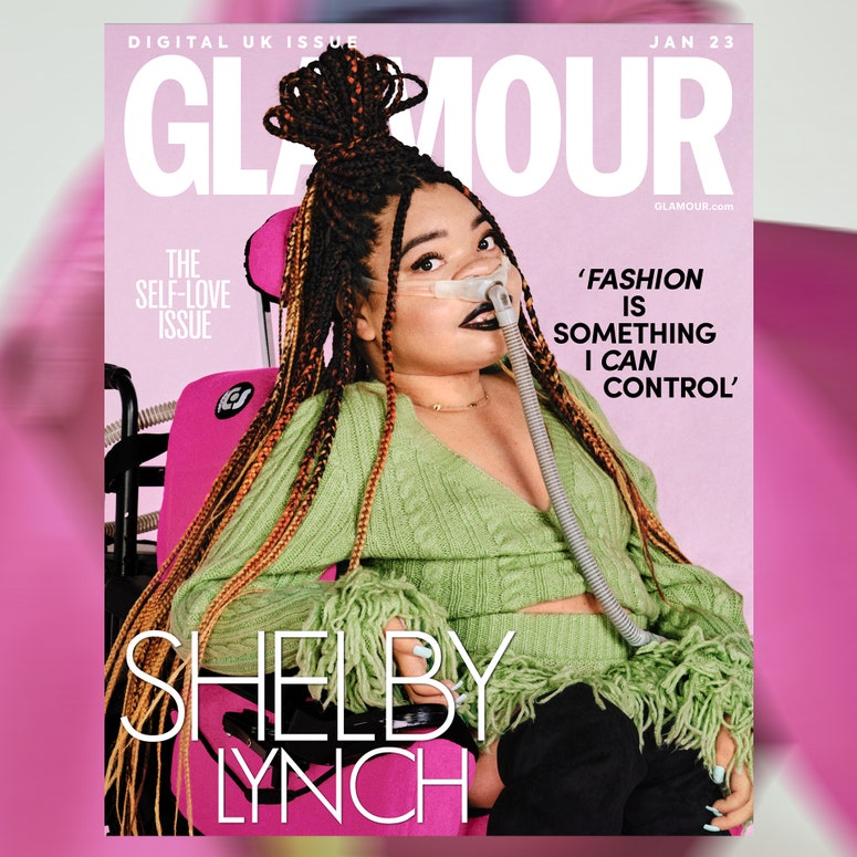 Text reads: GLAMOUR JAN 23, The Self-Love Issue, “Fashion is something I can control”, Shelby Lynch. Shelby Lynch, a mixed Black woman with Spinal Muscular Atrophy Type 2, looks directly at the camera. She is in front of a pink ombre background, is sitting in a fuchsia pink wheelchair and has a grey ventilator. She is wearing black lipstick, black mascara, and braided hair in a half-up, half-down style. She wears a sage green knitted dress with fringed cuffs and a short gold chain necklace.
